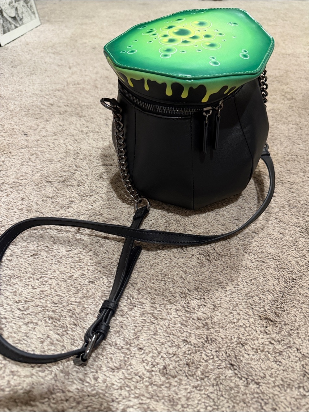 Mad Engine Cauldron Black Crossbody Bag with Green Graphic Top
